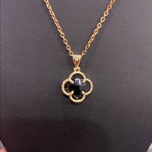 Elegant Gold and Black Pendant Necklace